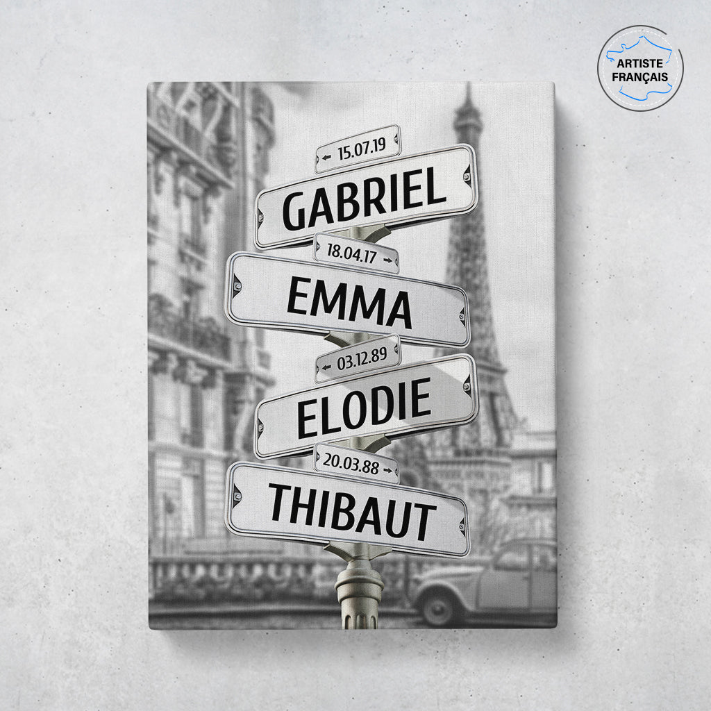 Un tableau personnalisé famille qui représente des panneaux de direction dans la vielle ville de Paris avec la tour Eiffel et une ancienne 2 cheveux Citroën rouge. Le design est en noir et blanc. Les prénoms et dates de naissances sur les panneaux sont personnalisables.