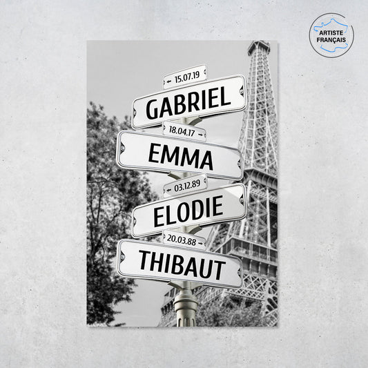 Une affiche personnalisée famille qui représente des panneaux de direction de la ville de Paris avec la tour Eiffel et un arbre en noir et blanc. Les prénoms et dates de naissances sur les panneaux sont personnalisables.