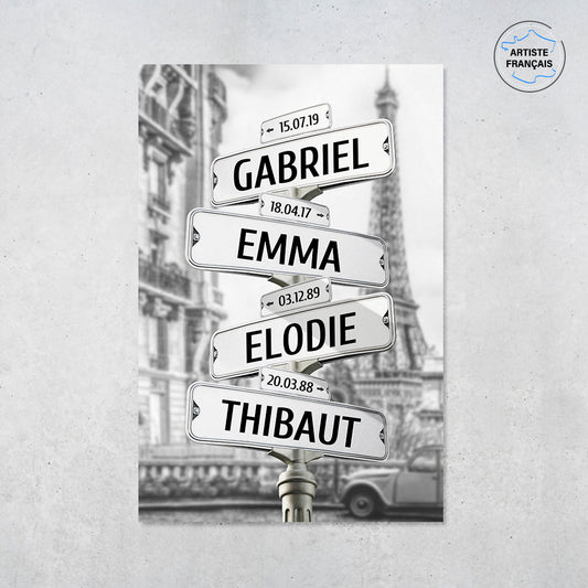 Une affiche personnalisée famille qui représente des panneaux de direction dans la vielle ville de Paris avec la tour Eiffel et une ancienne 2 cheveux Citroën rouge. Le design est en noir et blanc. Les prénoms et dates de naissances sur les panneaux sont personnalisables.